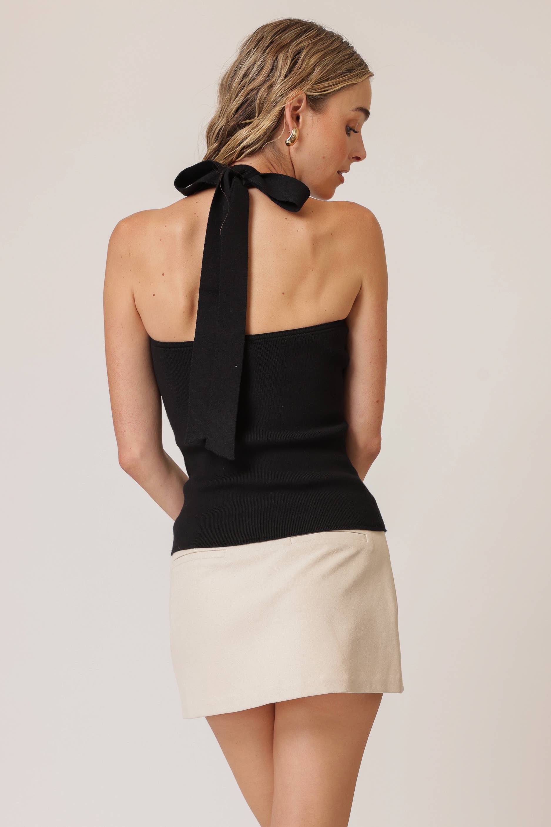BLACK TANNER HALTER SWEATER TOP for wholesale on Faire1