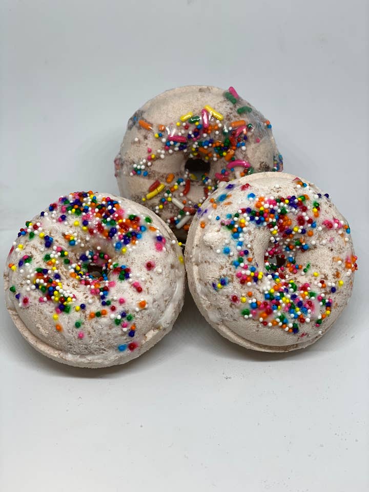 Birthday Cake Donut Bath Bomb for wholesale by Earthbound Apothecary