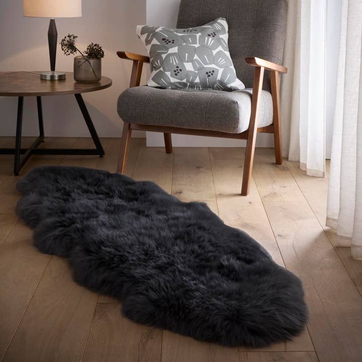 Origins Genuine Sheepskin Rug Black for wholesale by Phoenox Textiles