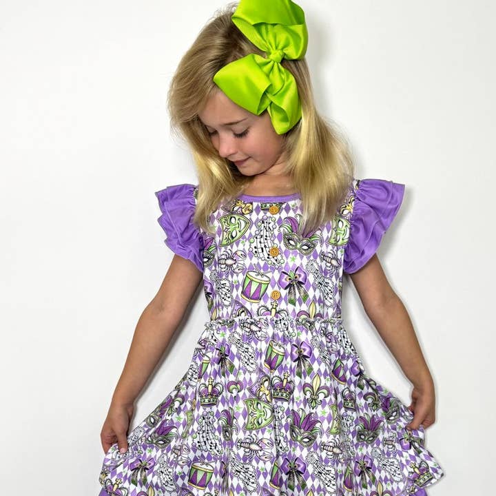 Mardi Mascarade Robe Fille pour la vente par Clover Cottage