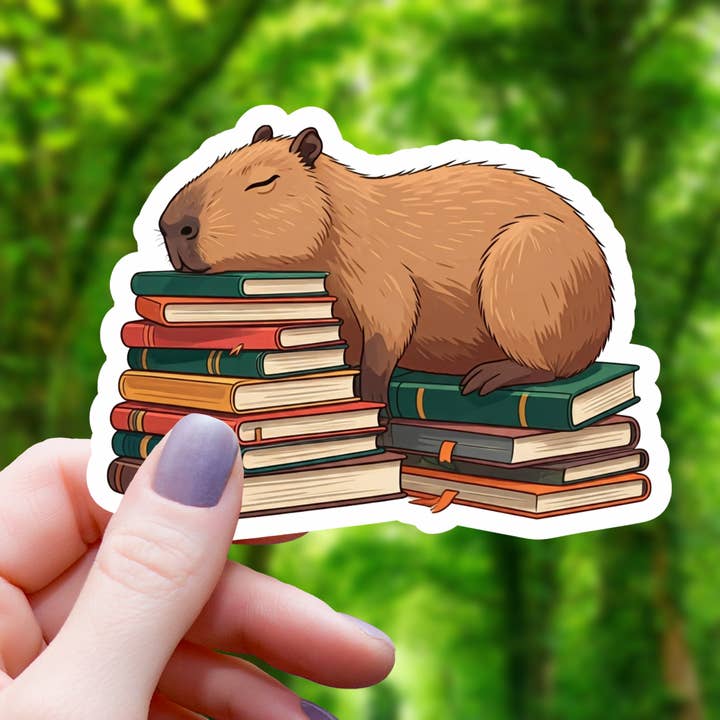 Mimic Gaming Co - Wholesale Sticker - Capybara Sleeping on Books Sticker- 3"
