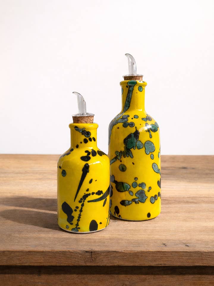 Gula spräckliga oljekannor för wholesale av Eturel Madrid