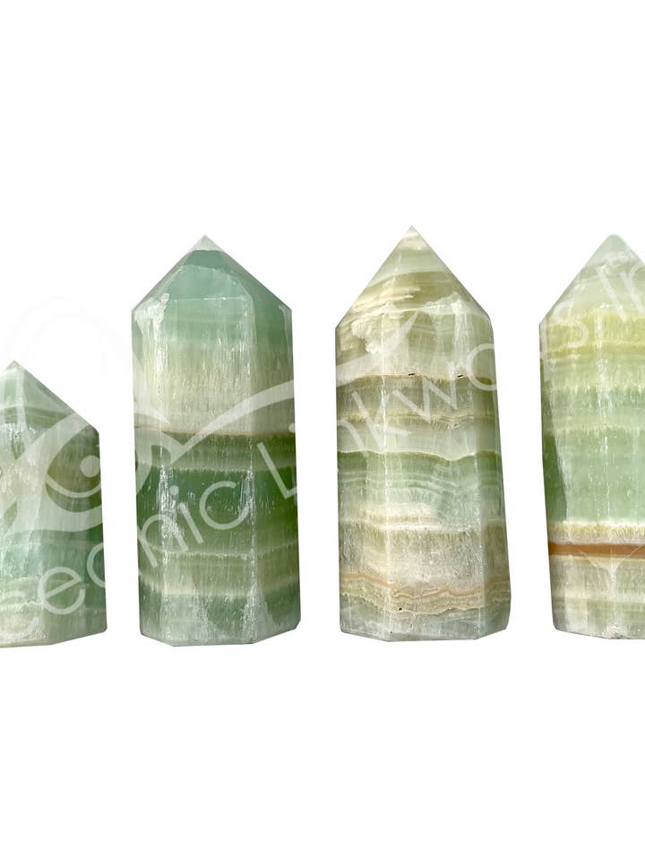 (1 LB)OBELISK - CALCITE, PISTACHIO 2-4" for wholesale by Oceanic Linkways Inc