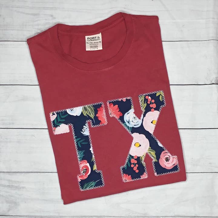 State Abbreviation Applique Short Sleeve TShirt for wholesale by Handmade Pieces Company LLC