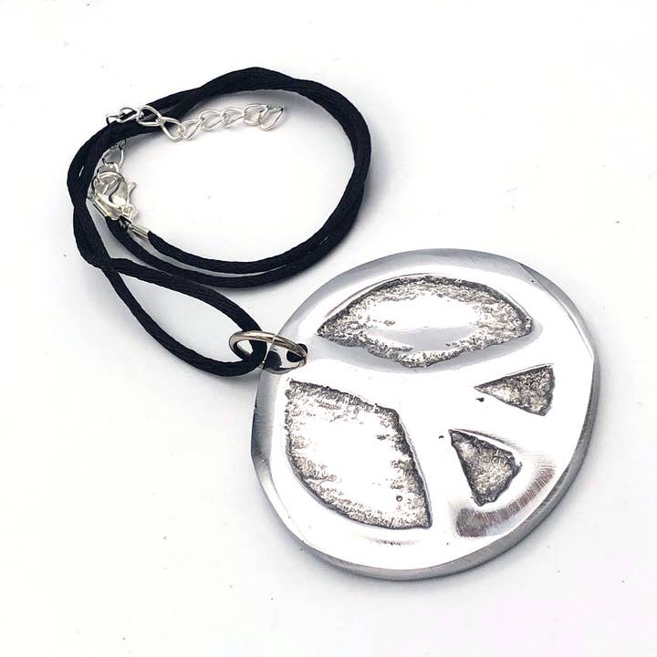 Recycled Aluminum Peace Necklace for wholesale by Women of the Cloud Forest
