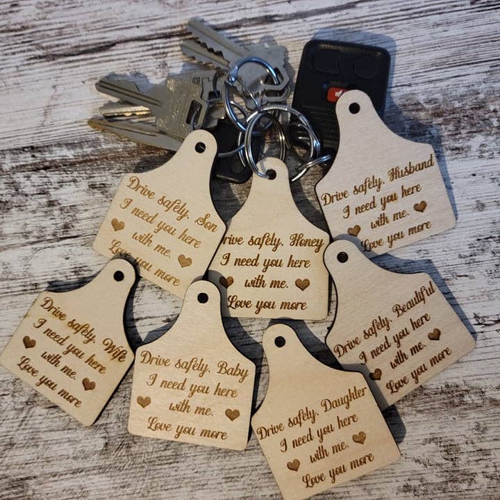 Drive Safe Wood Cow Tag Keychain for wholesale by Cowgirl with a Laser