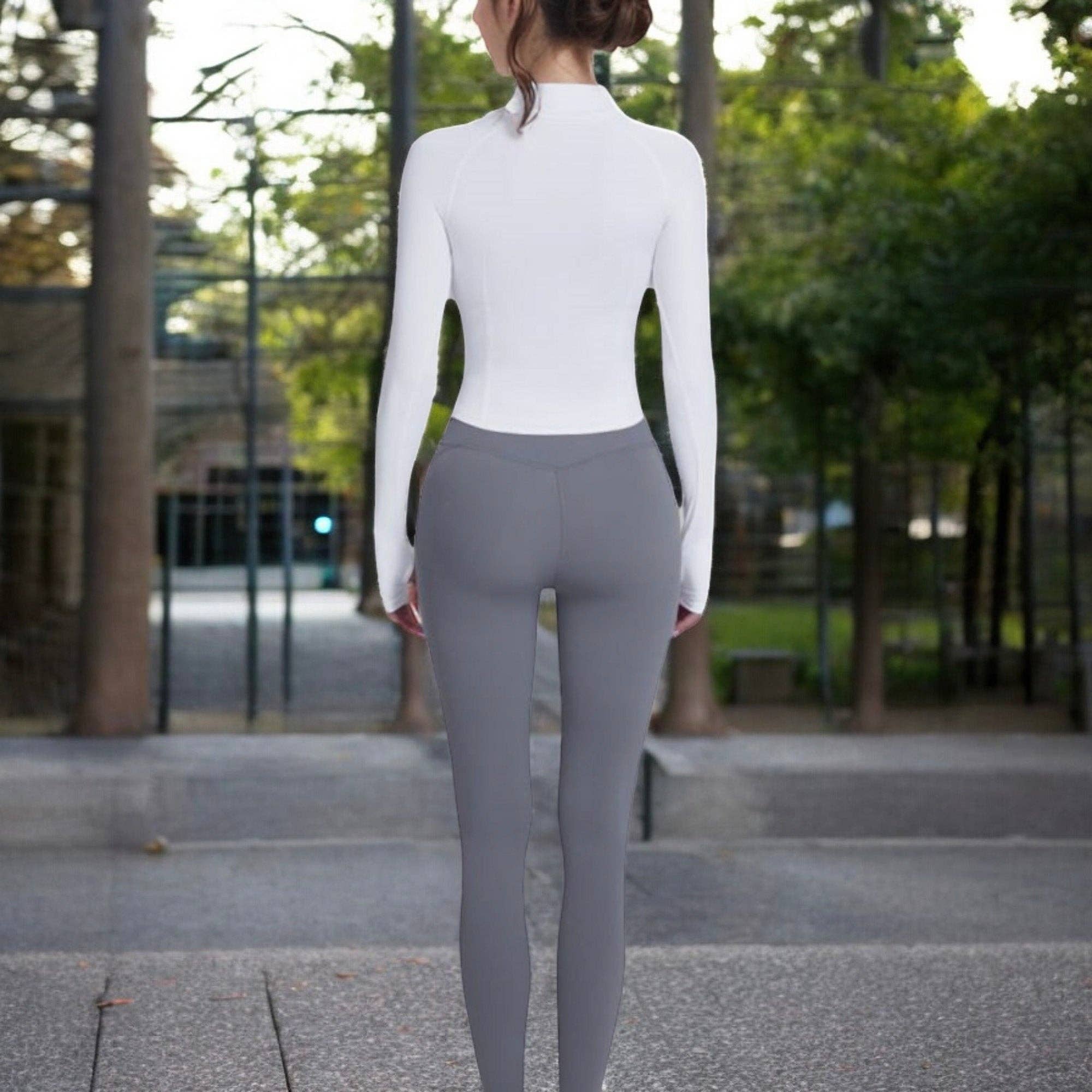 Active by Anna-Kaci - Wholesale Sporttop - Dames - Compressietop met lange mouwen en halve ritssluiting en contournaden16