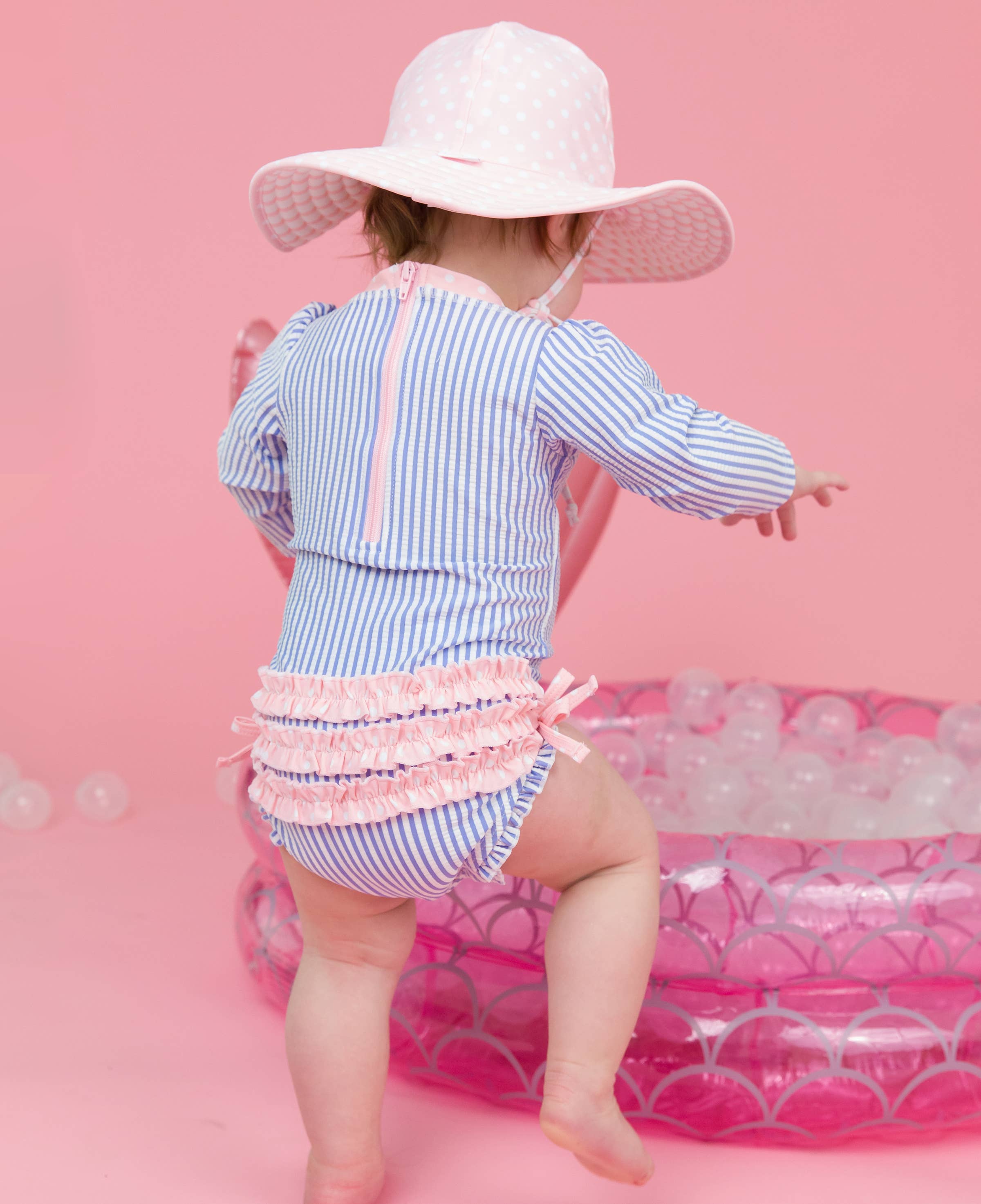 RuffleButts + RuggedButts - Wholesale Rashguard - Baby - Baby Girls Periwinkle Blue Seersucker Long Sleeve One Piece Rash Guard Swimsuit with Signature Rear Ruffles3