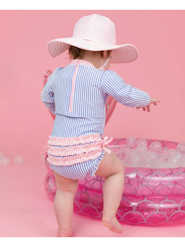 RuffleButts + RuggedButts - Wholesale Rashguard - Baby - Baby Girls Periwinkle Blue Seersucker Long Sleeve One Piece Rash Guard Swimsuit with Signature Rear Ruffles
3