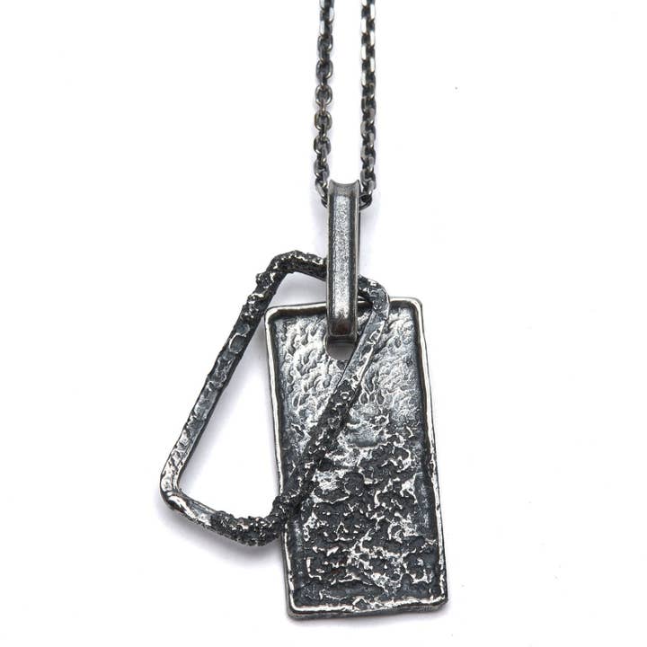Hollow Tag Necklace for wholesale by Buck Palmer