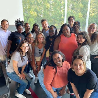 Employee group photo in a Faire office