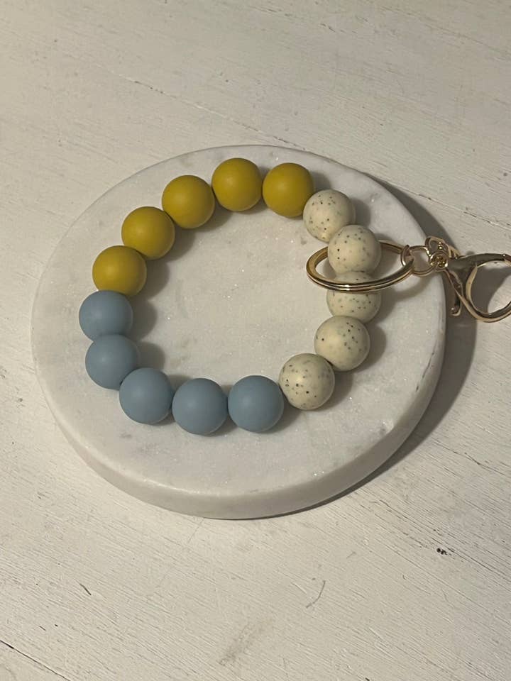 Porte-clés Dusty Mustard pour la vente par Inspiration Beads