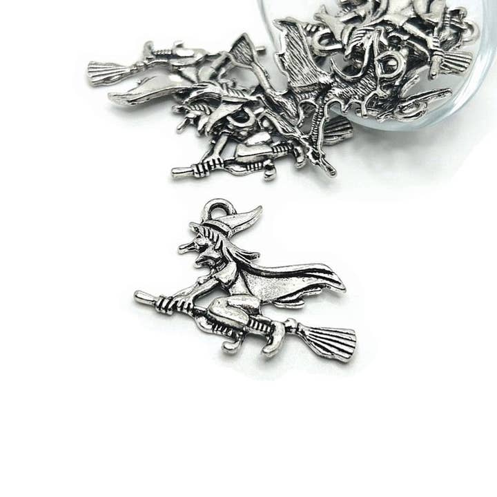 Silver Witch on Broom Halloween Charms, 30x37mm for wholesale by Guerrilla Charm