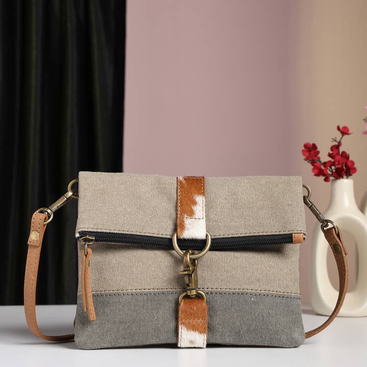 Finley Stone Cowhide Women's Crossbody Bag, Original Leather and other Purchase Wholesale hair on hide purses. Free Returns & Net 60 Terms on Faire trending on Faire.