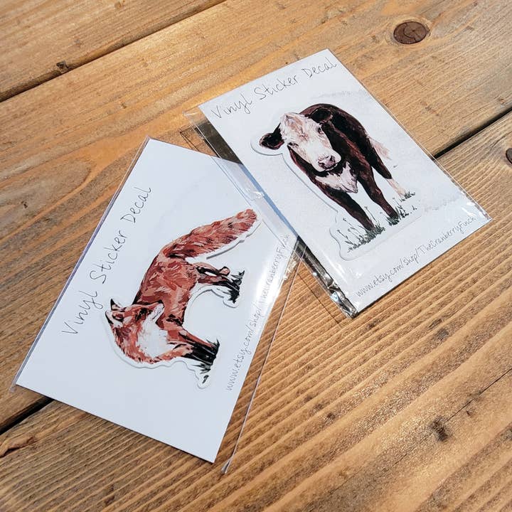The Cranberry Finch – wholesale Klistermärke – Gris ansikte vinyl klistermärke