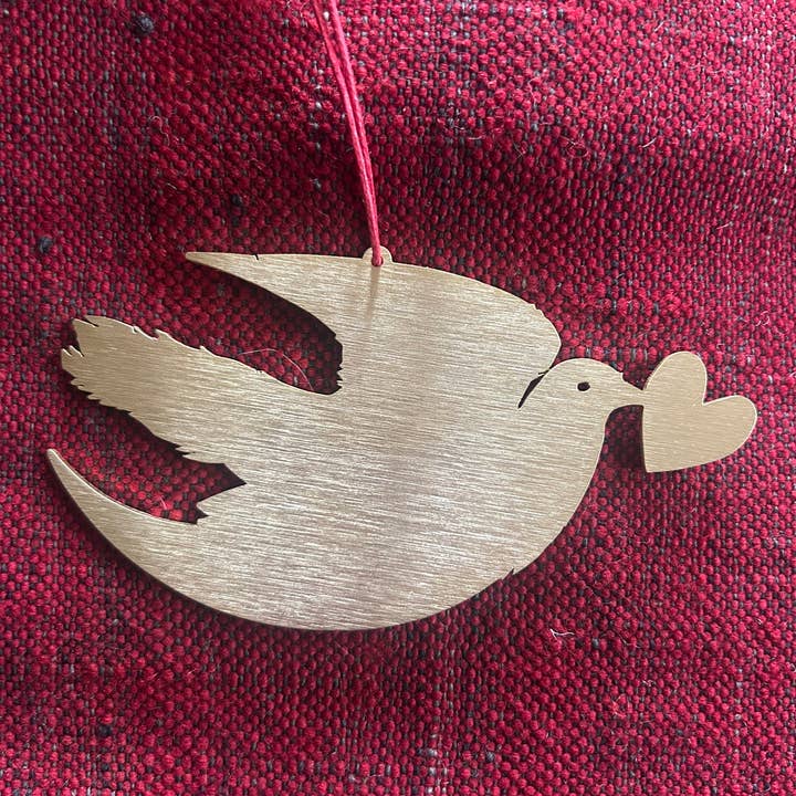 Solid Brass Dove heart decoration for wholesale by Clare O’Neill Artworks