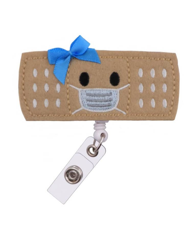 Badge Reel Bandaid with Mask for Nurse Doctor Name Tag Holder with Clip for wholesale by Acclaim Status Company LLC