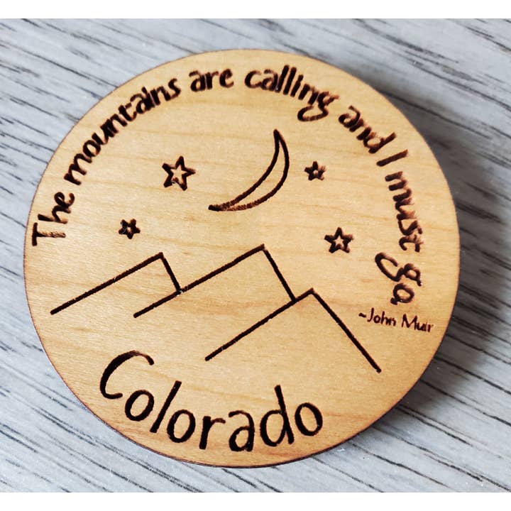 Magnet 2-inch Round Mountains are Calling (Colorado) for wholesale by Wordsmith Laser