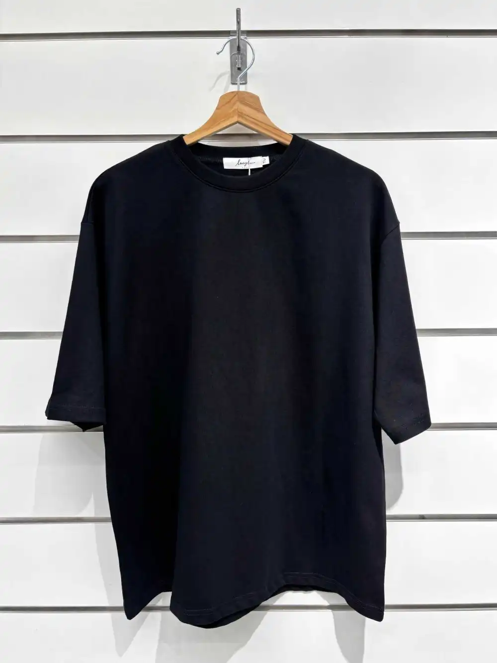 Nero T-shirt oversize basic con scollo rotondo di alta qualità in vendita all'ingrosso su Faire1