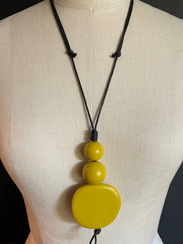 WISDOM: Warm Rich Golden Color Resin Beads Adjustable Length for wholesale by Alter Ego Designs