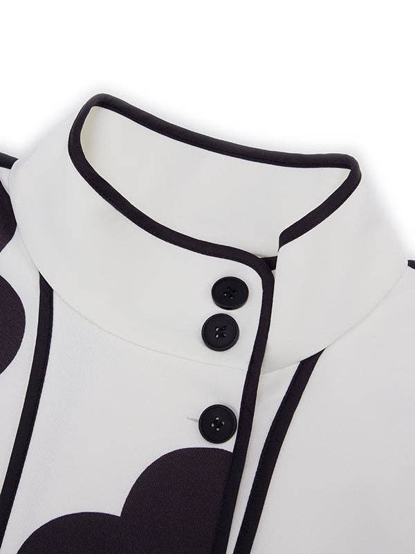 PRETO BRANCO Casaco de gola alta com manga longa, corte solto, estampa floral em cores contrastantes e abertura lateral para venda a revendedores na Faire6