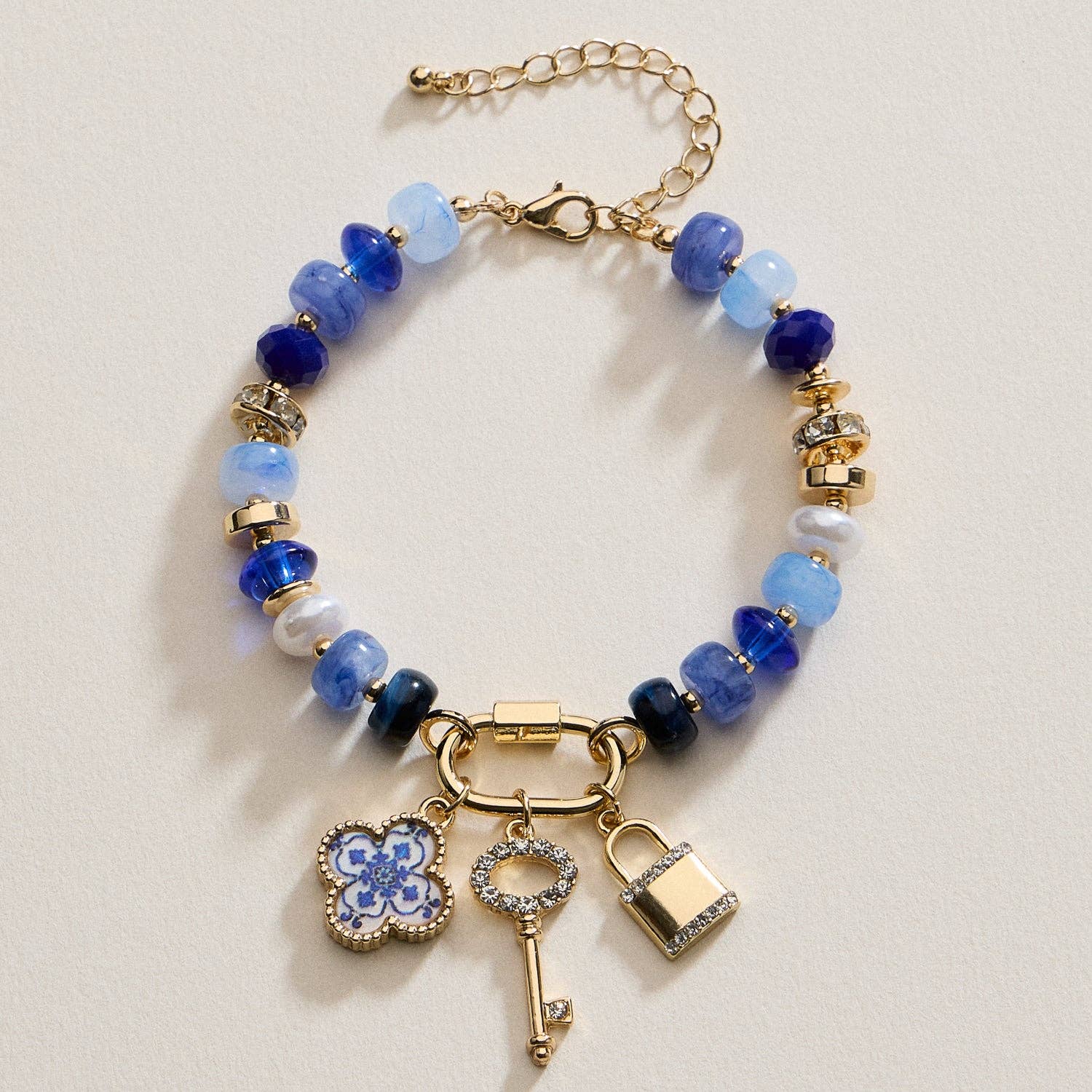 Frem - Wholesale Charm/Dangle Bracelet - Vibrant Beaded Bracelet with Gold-Tone Trio Charms2