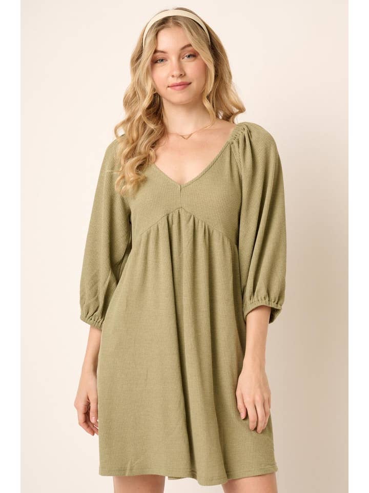 MINIKLEID AUS THERMOSTRICK MIT OFFENEM RÜCKENDETAIL für den Großhandel von mittoshop