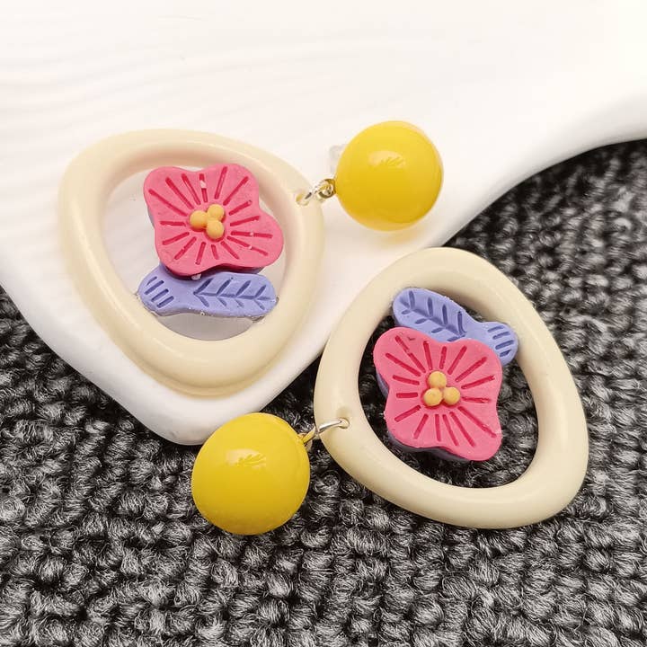 YK - Hollow Flower Charm Post Earrings for wholesale by Mio Queena