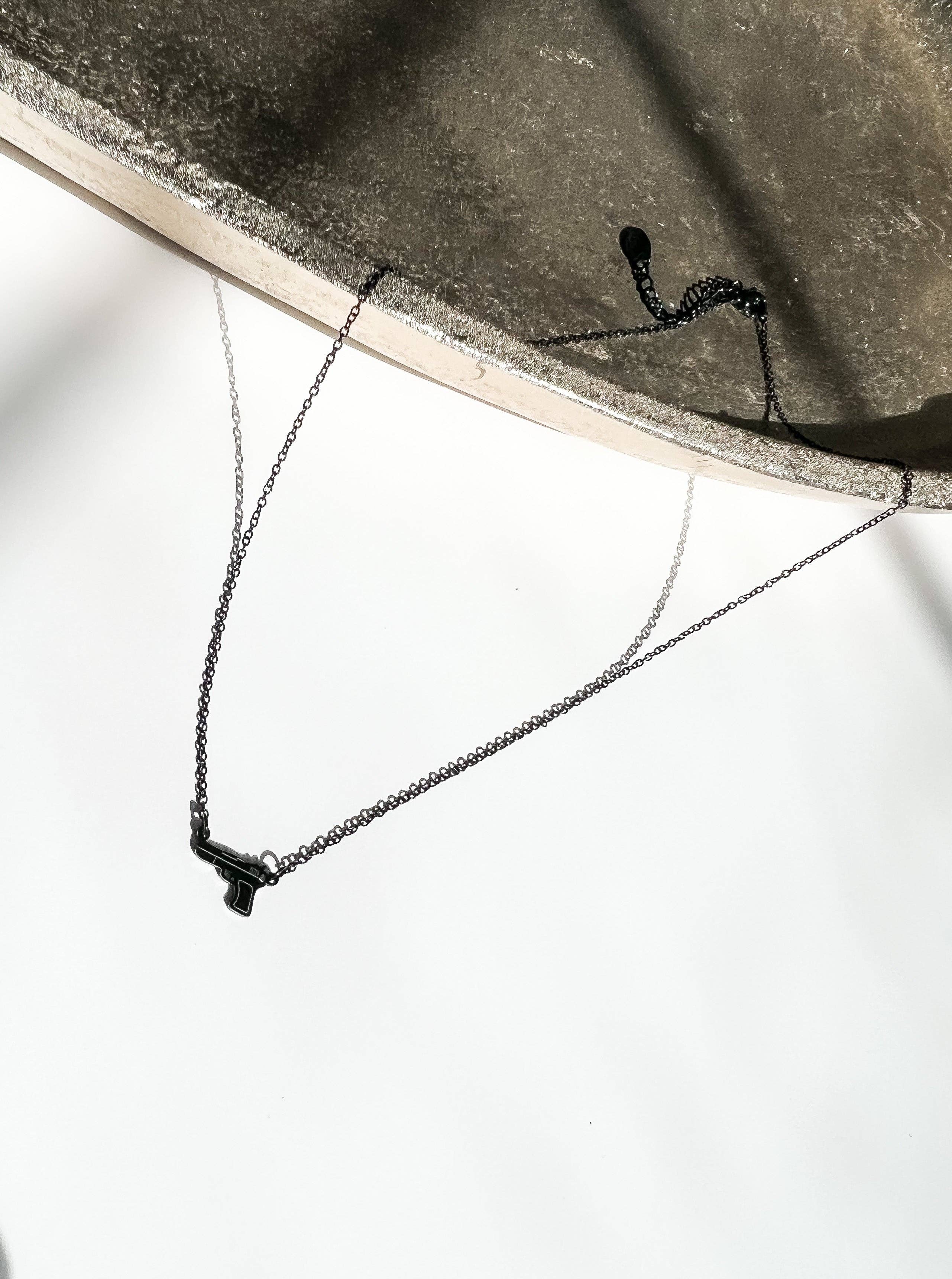 Armed In Style - Wholesale Pendant/Charm Necklace - Tiny Gun Necklace0