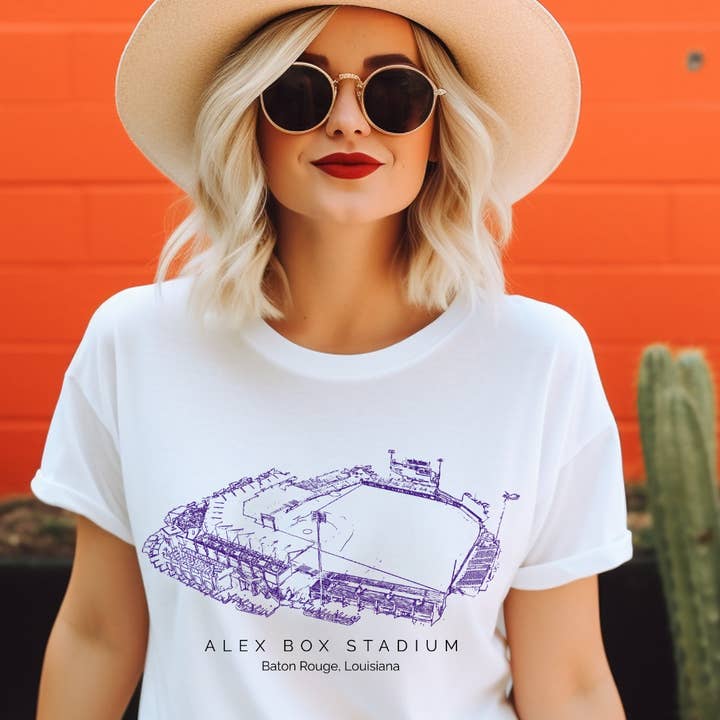 Alex Box Stadium Louisiana Adult Tee (Purple) and other Purchase Wholesale purple t shirts. Free Returns & Net 60 Terms on Faire trending on Faire.