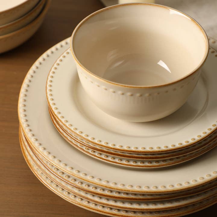 Comet Stoneware Dinnerware Set - Cream for wholesale on Faire2