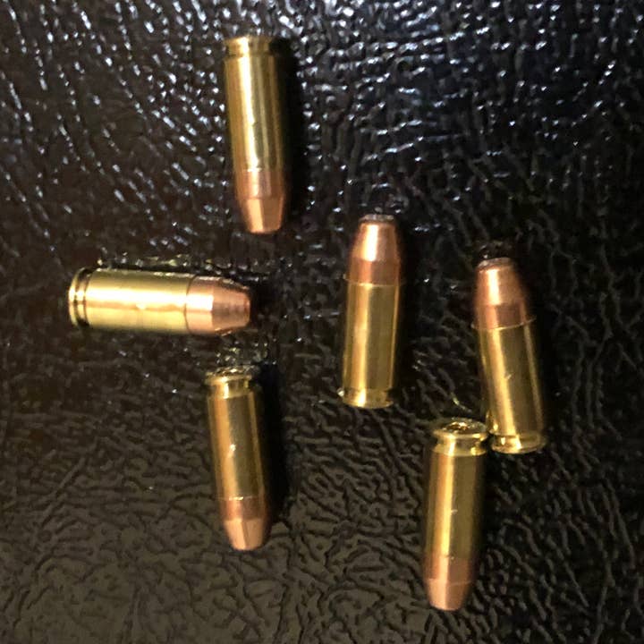 6 Pack of Real .40 Cal Bullet Fridge Magnets for wholesale by MB Designs