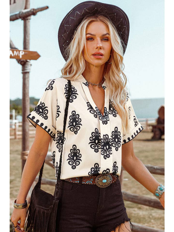 As shown Fashion-W Boho Geometric Print Short Sleeve V Neck Blouse for wholesale on Faire