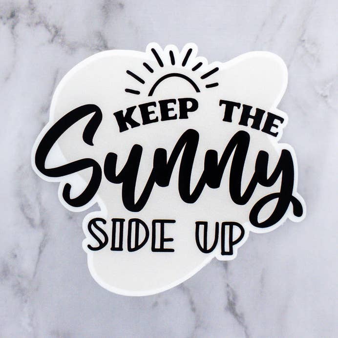 Holde den solrige Side Up Sticker for engroshandel hos MaMarie & Co.