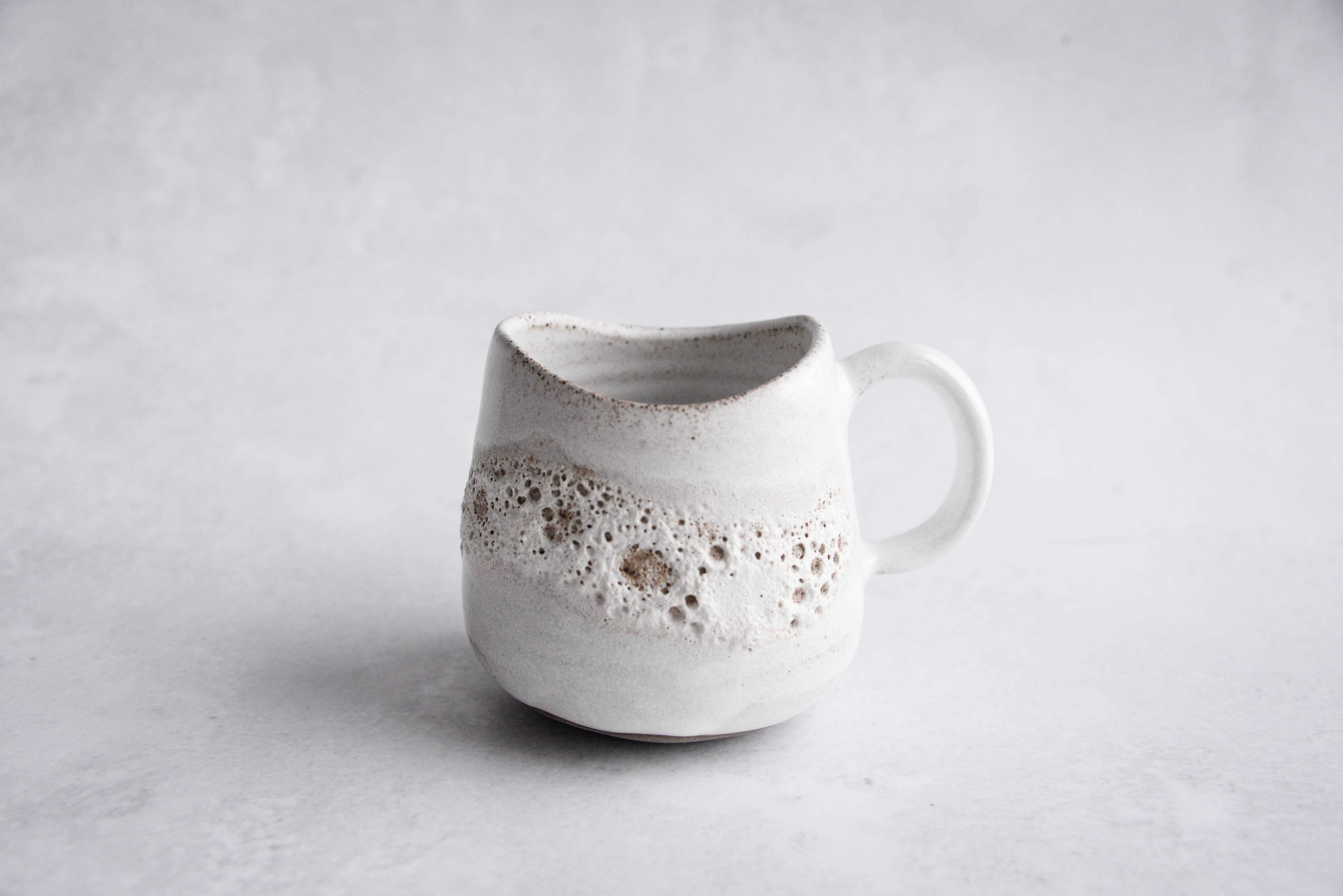 LAIMA CERAMICS (SIA Radosa Apvieniba Spares) - Wholesale Coffee Mug - MOON Collection STABILITY Mug – White Crater Glaze Stoneware2