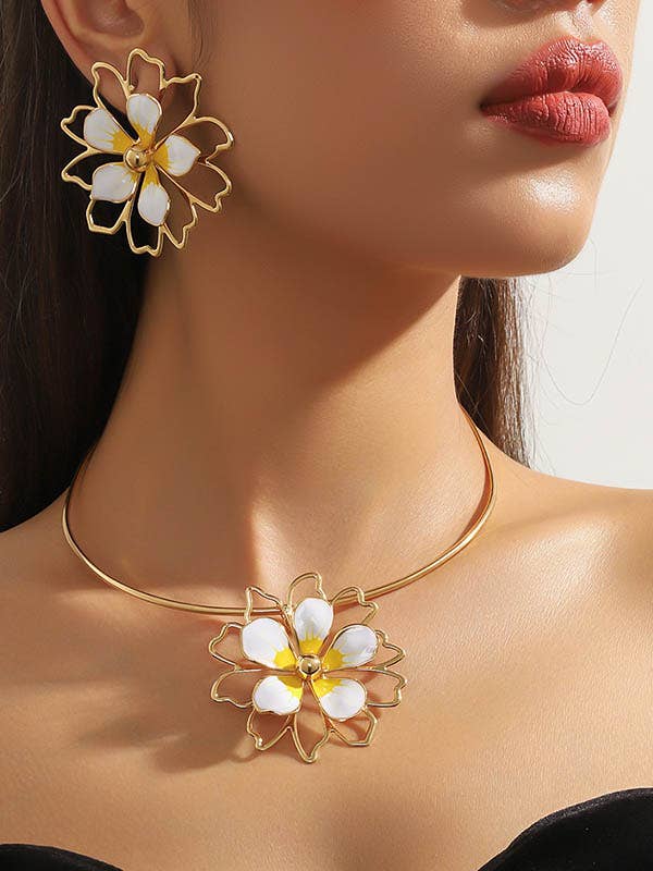 Boucles d'oreilles en forme de fleur creuse léopard + colliers accessoires trois pièces pour la vente par VividLux