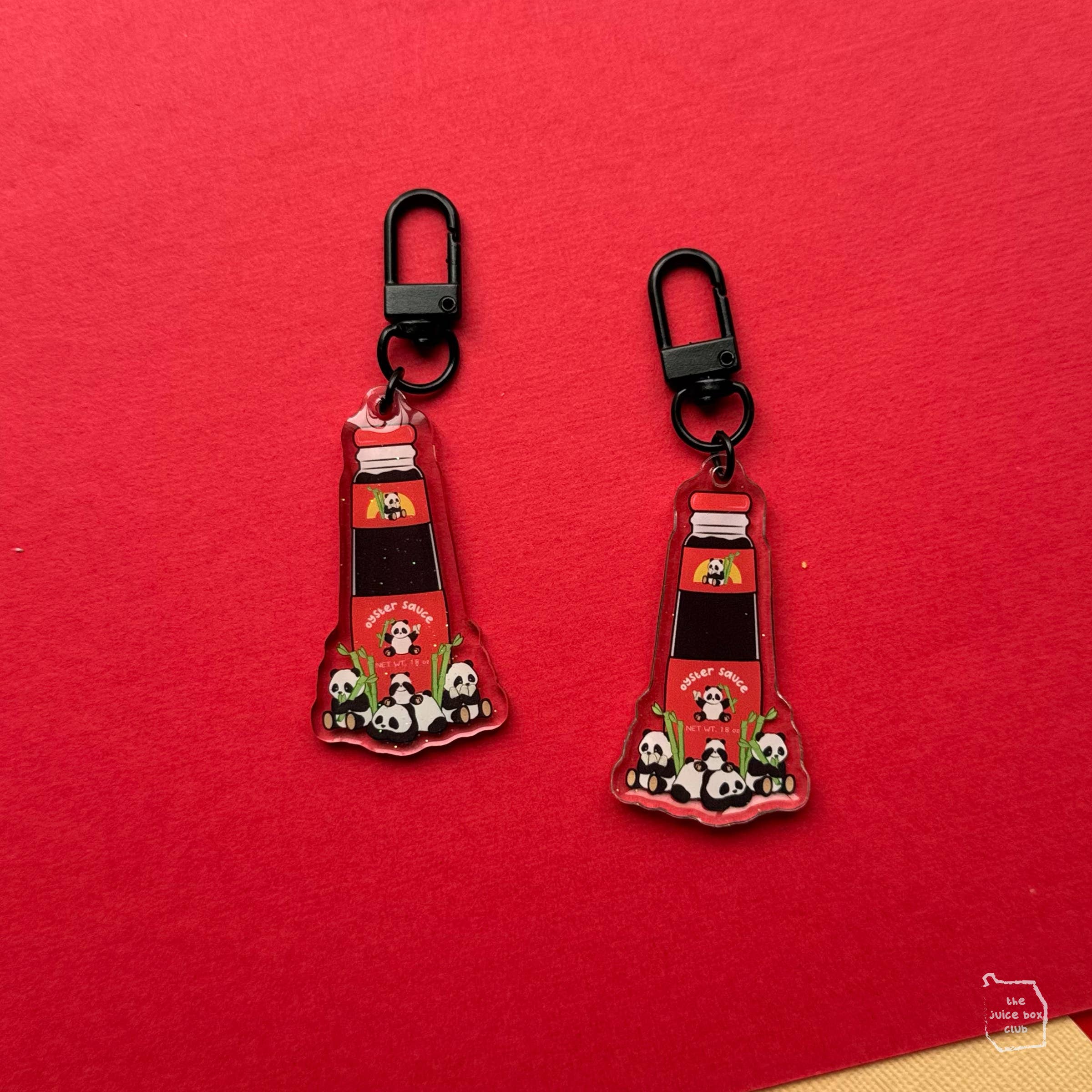 The Juice Box Club – Großhandel Schlüsselanhänger – Damen – Anhänger aus Acryl mit niedlicher Tiersauce und Oyster Panda0