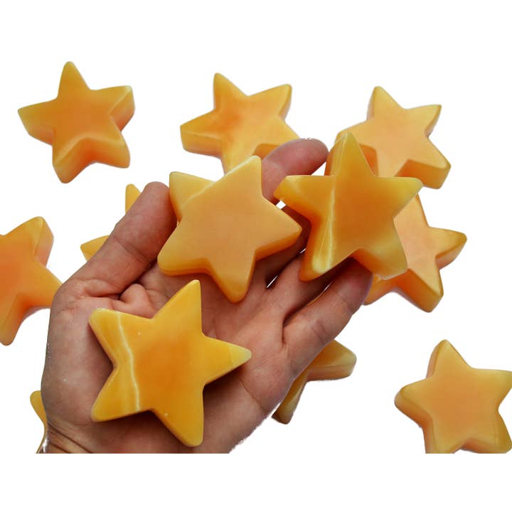 Stjerne af orange calcit (60 mm) for engroshandel hos Kaia & Crystals