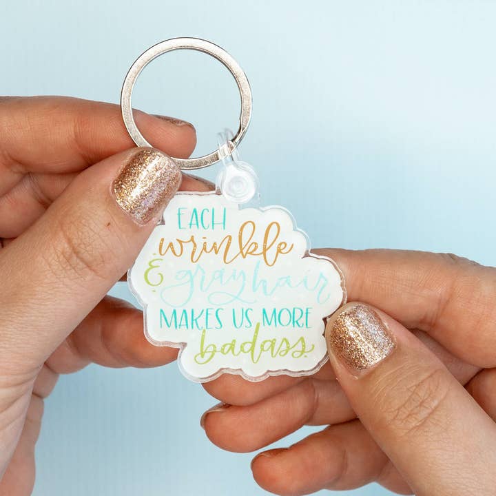 Wrinkle Badass - 6 keychains for wholesale by Colette Paperie