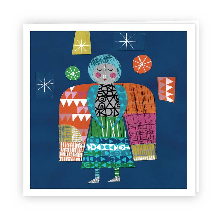 standing angel christmas card for wholesale by Clare Youngs