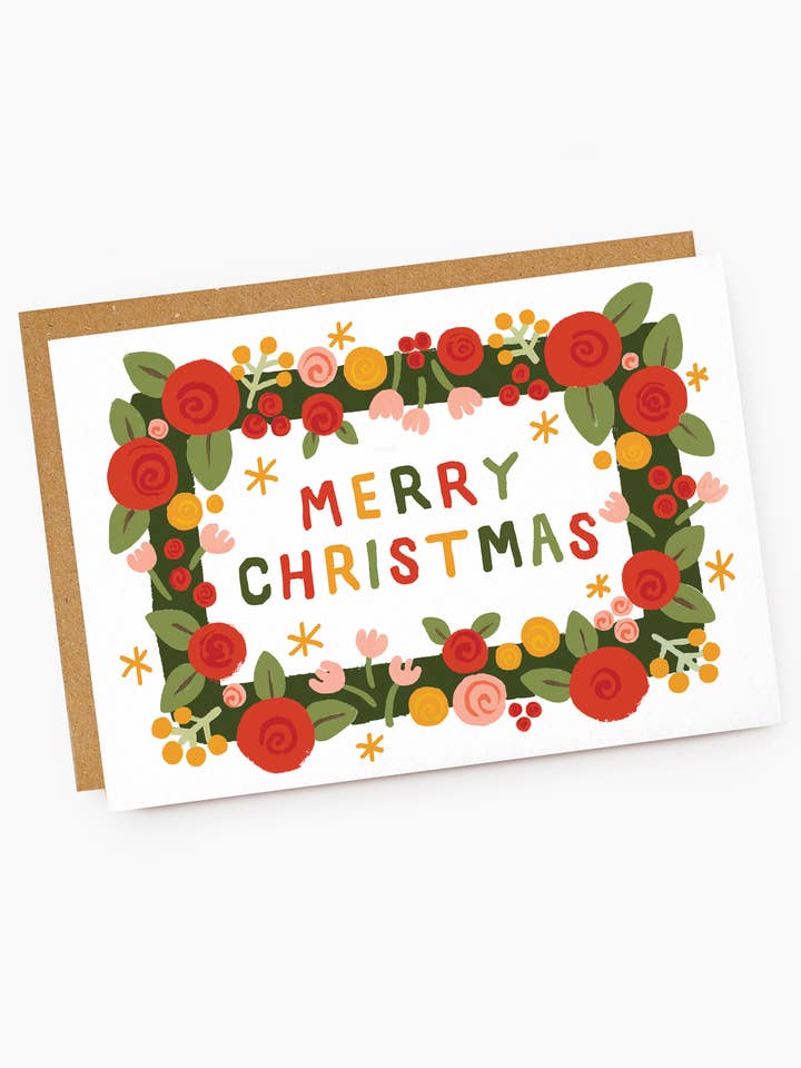 Biglietto di Buon Natale con bordo floreale colorato per la vendita all'ingrosso da parte di Jade Fisher