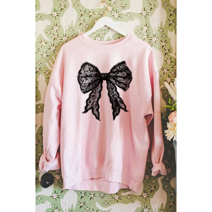 Illustrated Society - Vendita all'ingrosso Felpa stampata - Donna - FELPE CON GRAFICA VINTAGE CON FIOCCO IN PIZZO