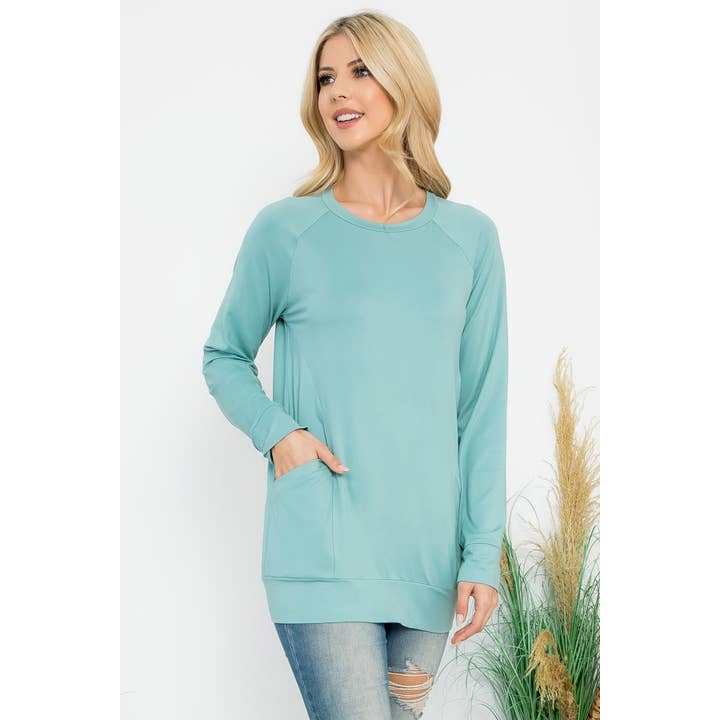 Solid Long Sleeve Front Pocket Top and other Purchase Wholesale long sleeve pocket t shirts. Free Returns & Net 60 Terms on Faire trending on Faire.