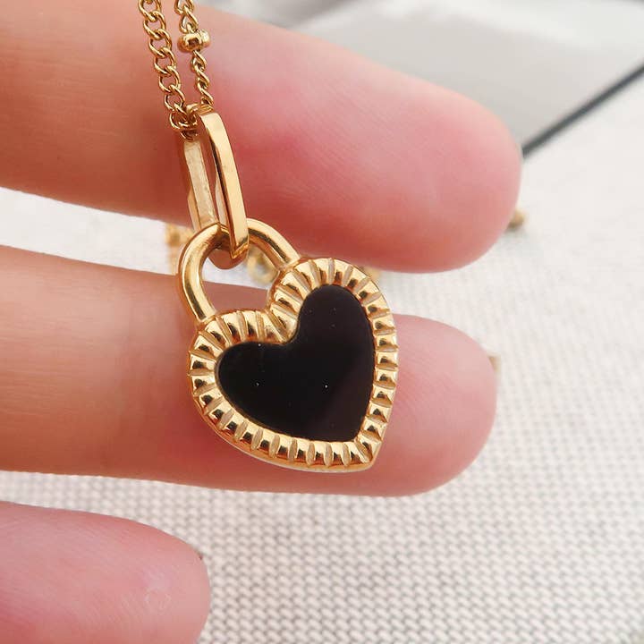Kylie Non-Tarnish Double-Sided Black & White Heart Necklace for wholesale on Faire