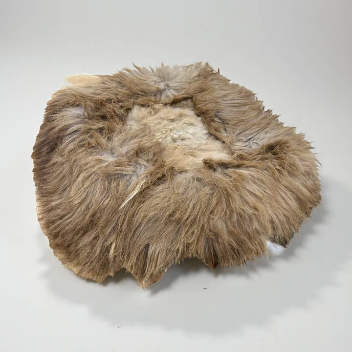 Brown sheepskin pet bed for wholesale by Western Linens
