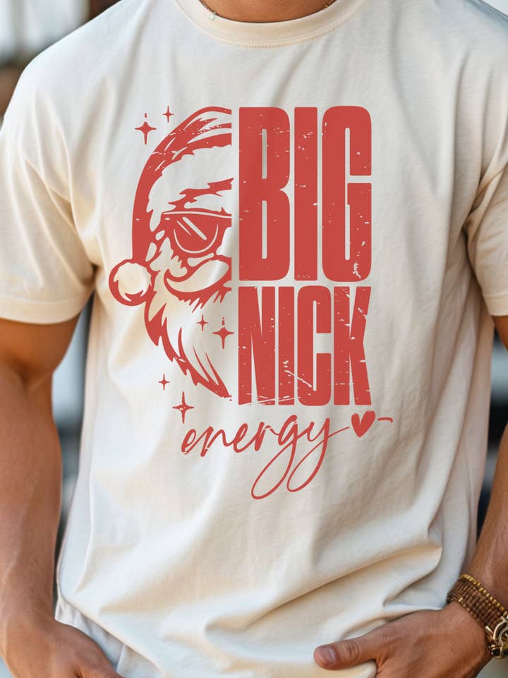 Big Nick Energy T-Shirt – Funny Christmas Shirt, Santa Humor Tee, Holiday Party Shirt, Sassy Xmas Graphic Tee and other Purchase Wholesale funny graphic tees. Free Returns & Net 60 Terms on Faire trending on Faire.