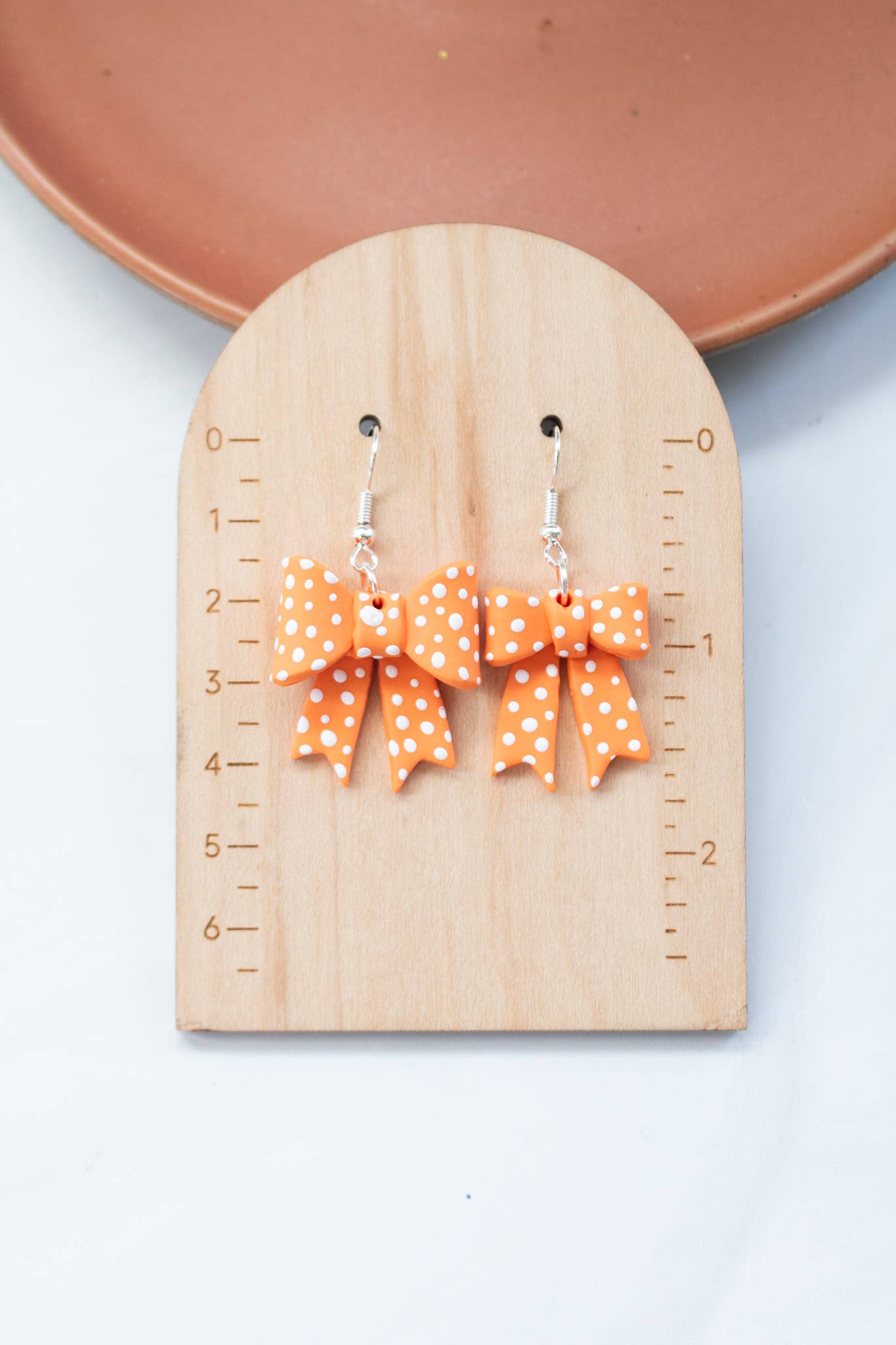 EJ Clay Co - Wholesale Dangle Earrings - TN Vols Orange & White Polka Dot Bows5