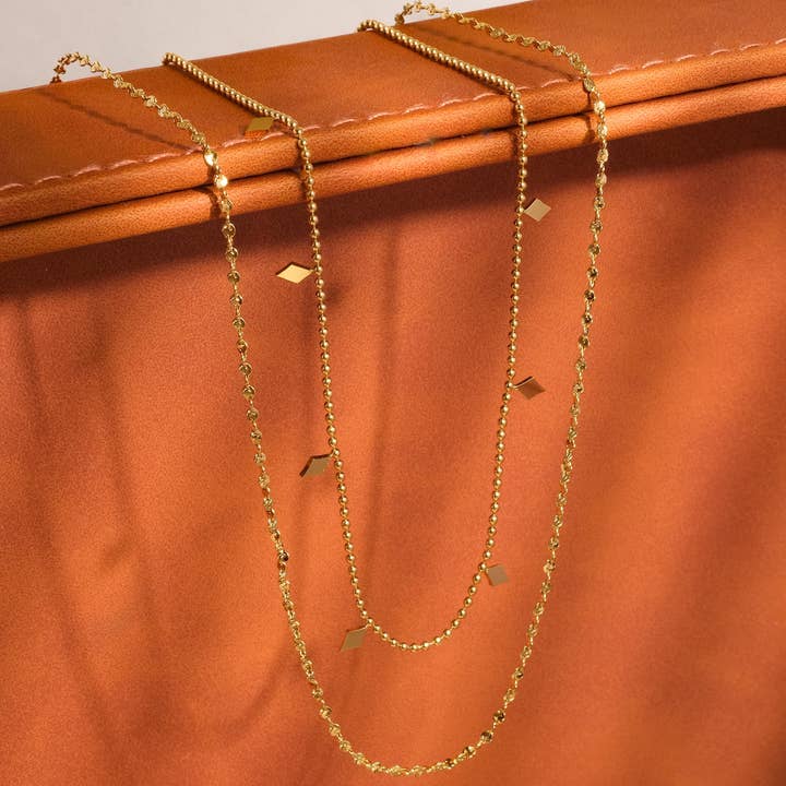 Arômes 18K Gold Non-Tarnish Layered Tassel Necklace for wholesale on Faire
