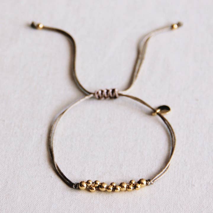 Satin Bracelet With Gold Colored Beads - Taupe / Gold for wholesale by Bazou