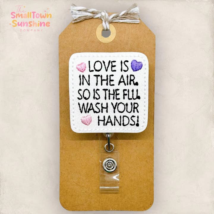 Love & Flu Wash Your Hands Badge Reel - pink/purple hearts for wholesale by The SmallTownSunshine Company
